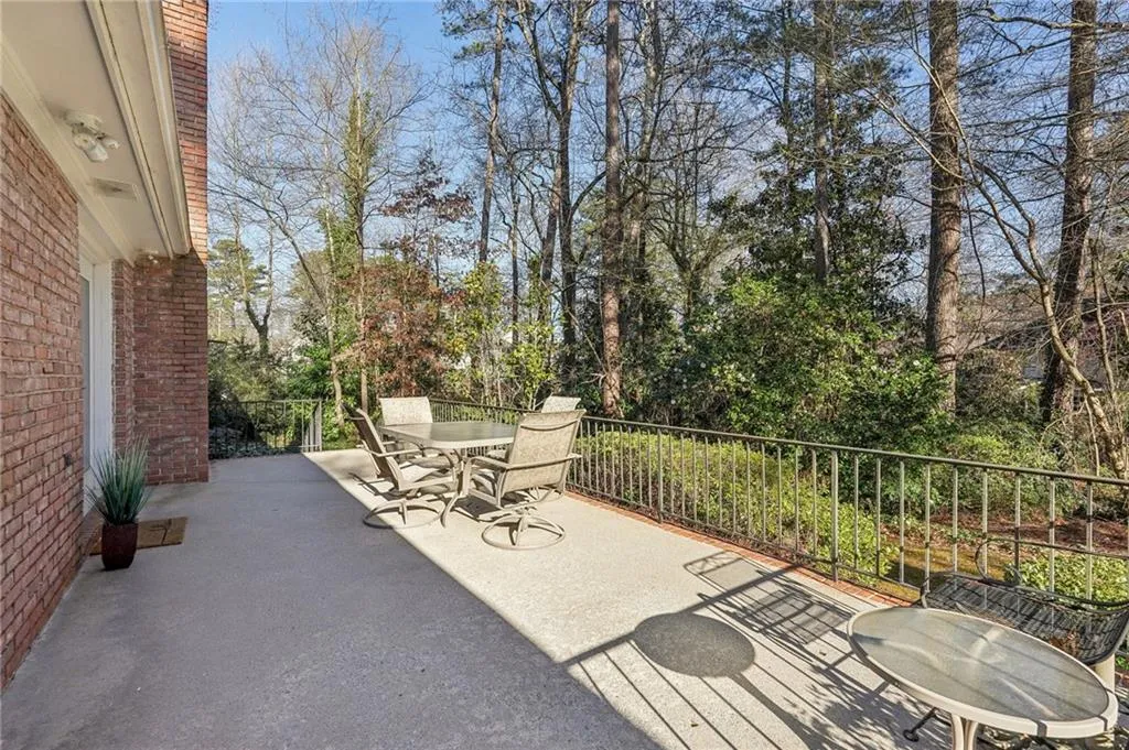 Brick and concrete patio off the family room.