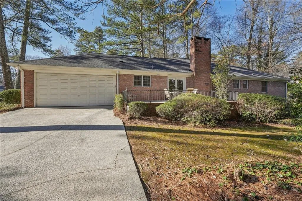Rear brick and concrete patio