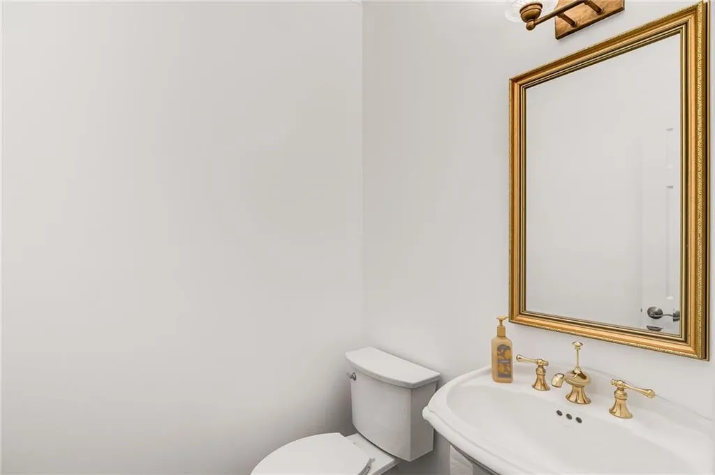 Bathroom featuring toilet and a sink