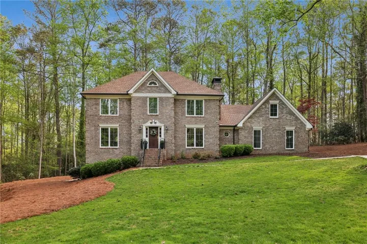 Beautiful curb appeal!! Over an acre