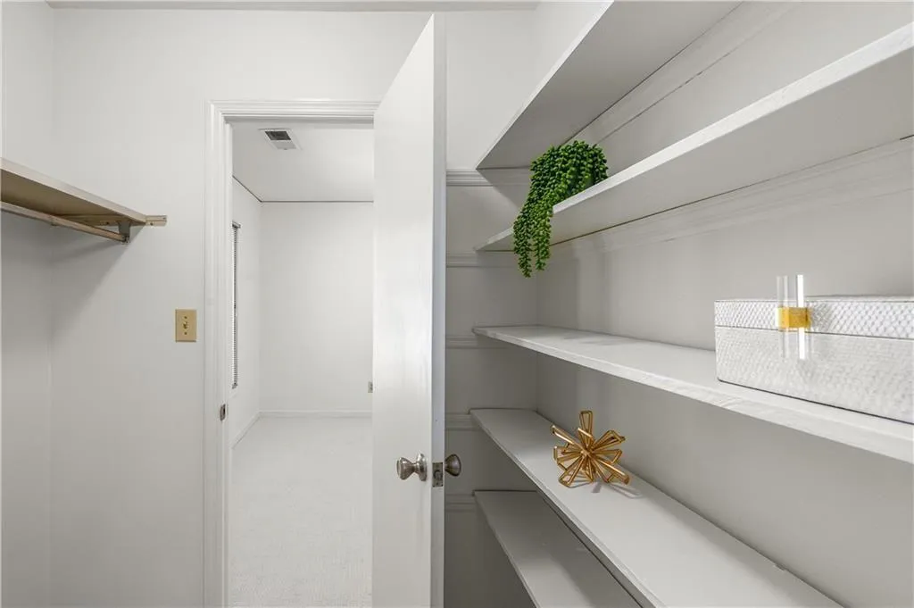 25 Forrest Place~ Walk in closet with shelving belonging to Secondary Bedroom #2.