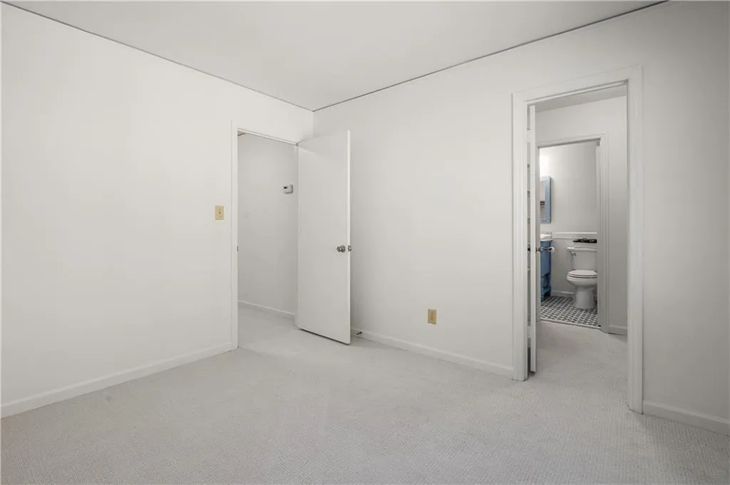 25 Forrest Place~ Secondary Bedroom #2 is also spacious, light and bright.