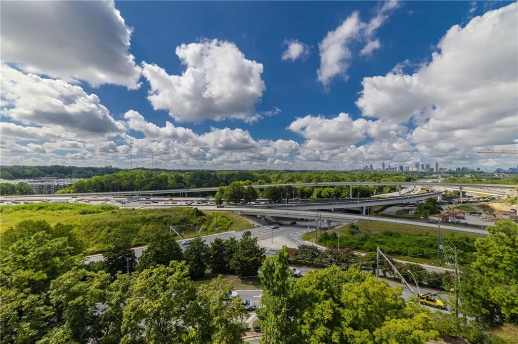 Bird's eye view of a main thoroughfare and city skyline