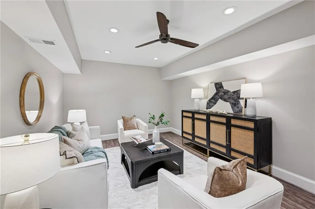 Sitting room with wood finished floors, recessed lighting, and ceiling fan