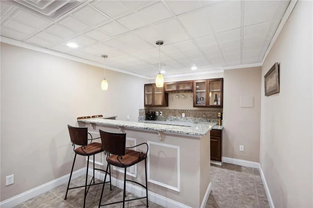Kitchenette with bar and seating
