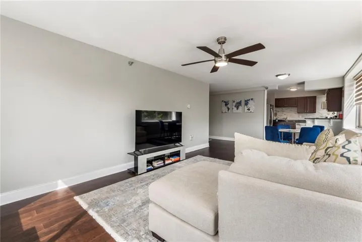 Designed for Living: Large, versatile wall space in the main living area, ideal for a home entertainment setup, complemented by sleek dark flooring. Plenty of room for that 75-inch TV or a gallery wall, fitting a modern buyer’s media needs.