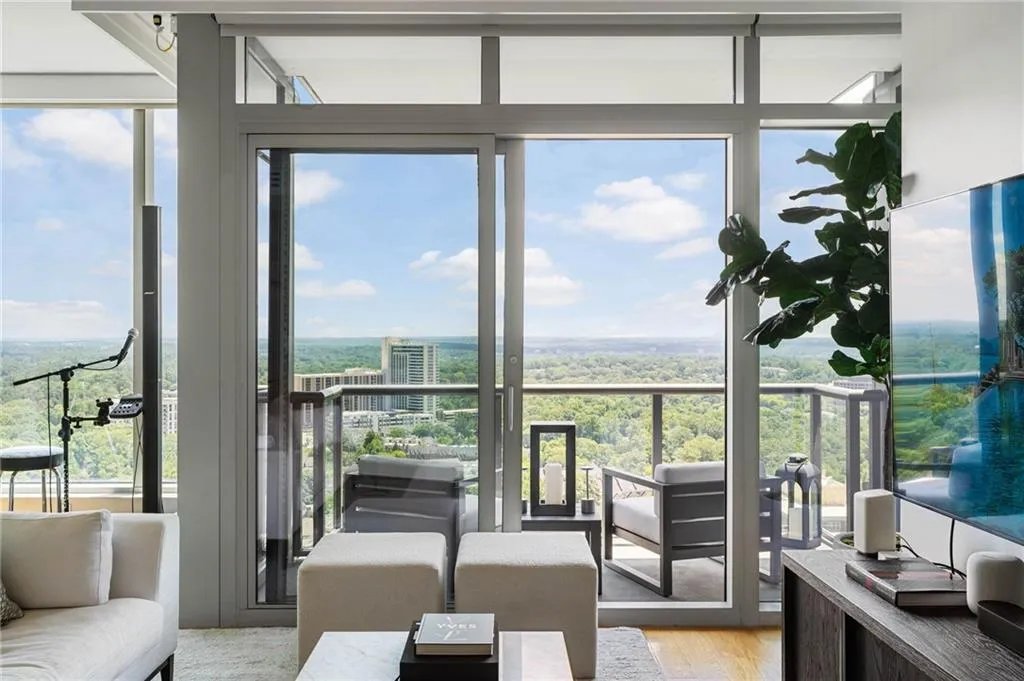 Living area featuring plenty of natural light and light wood-style floors