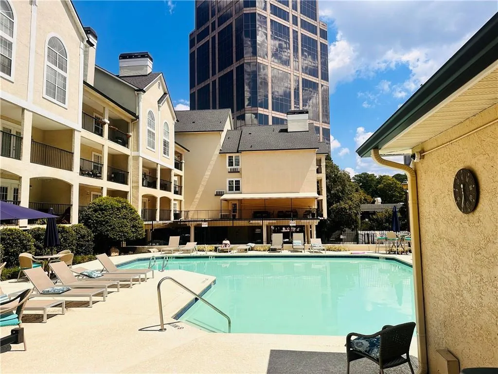 Community pool featuring a patio area