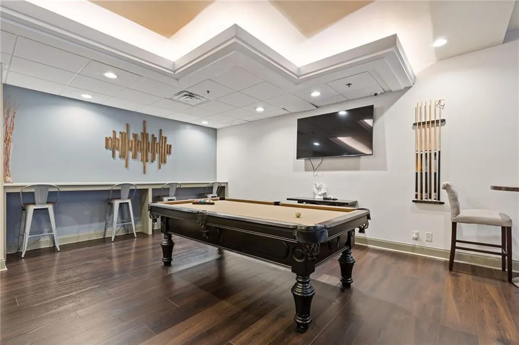 Rec room with billiards table, dark wood-type flooring, and recessed lighting