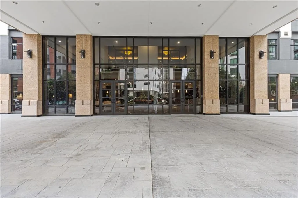 View of exterior entry featuring french doors