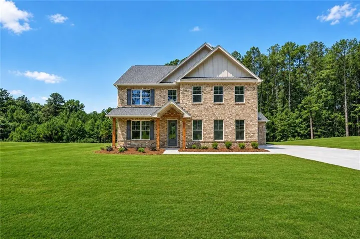Brick and siding exterior with a gabled roof