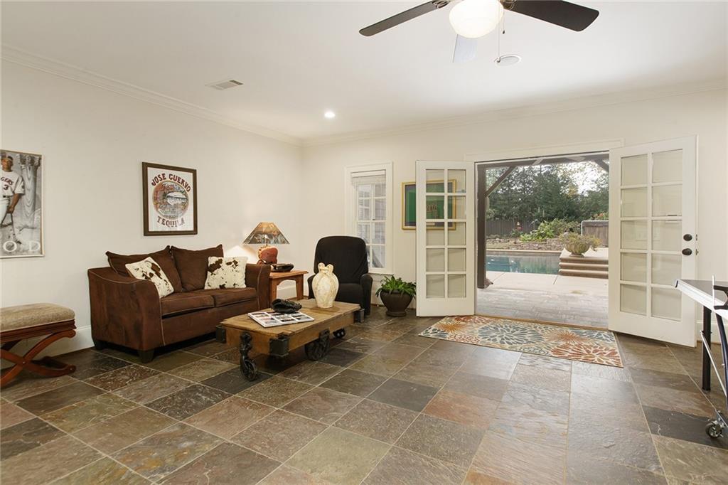 Rec room opens to a covered patio