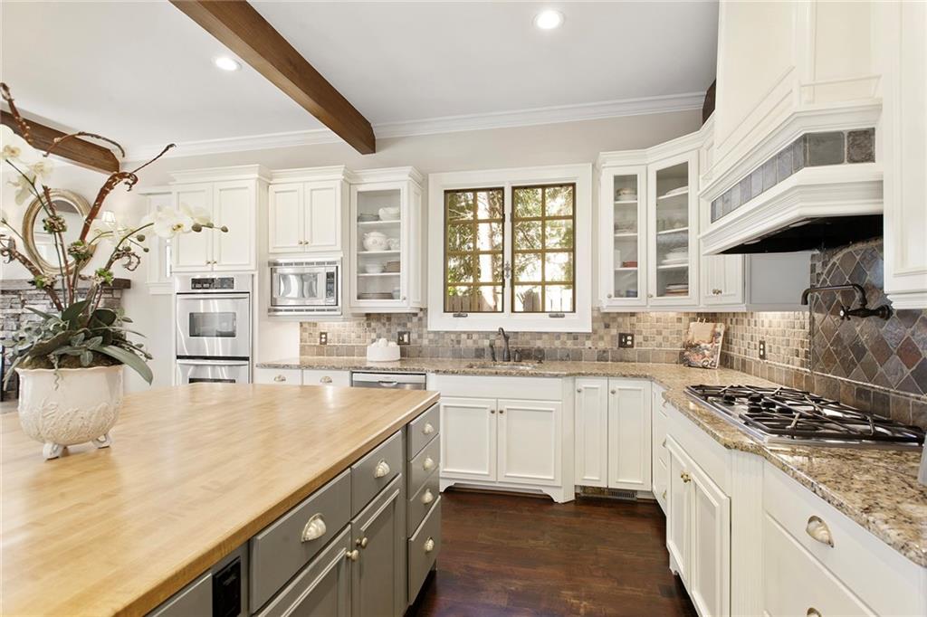 Double ovens, Bosch dishwasher, 5 burner gas cooking with pot filler, subzero refrigeration, and 2 pantries!