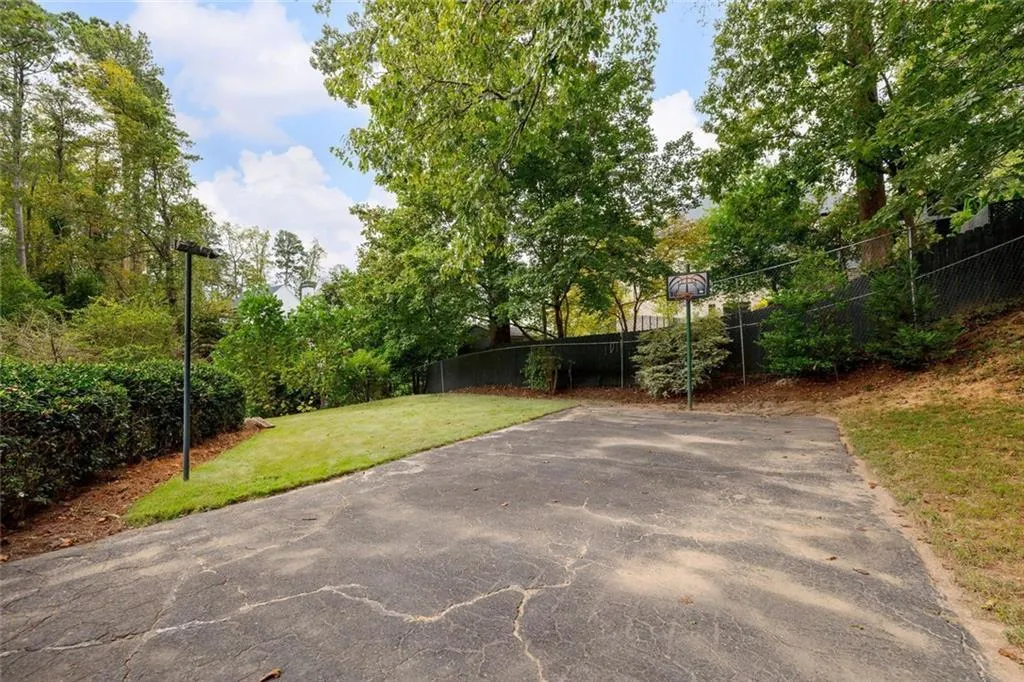 Terraced Backyard with half basketball court