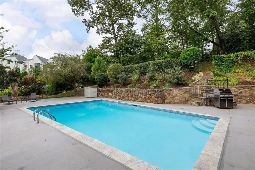Pool with terraced back yard