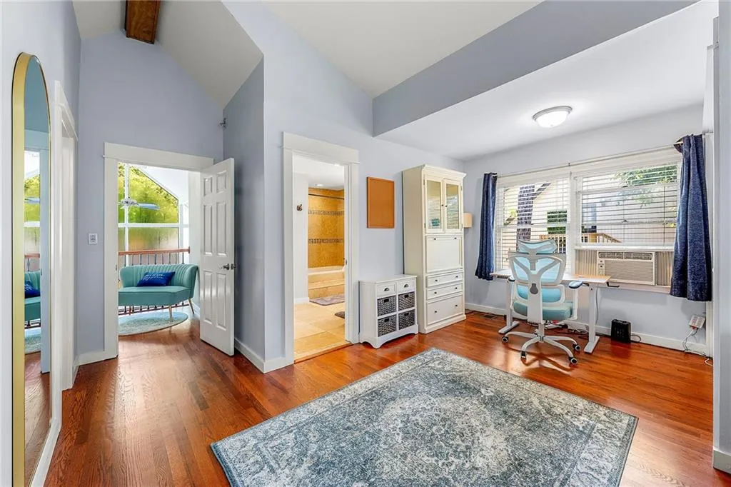 Nook office featuring wood finished floors and baseboards