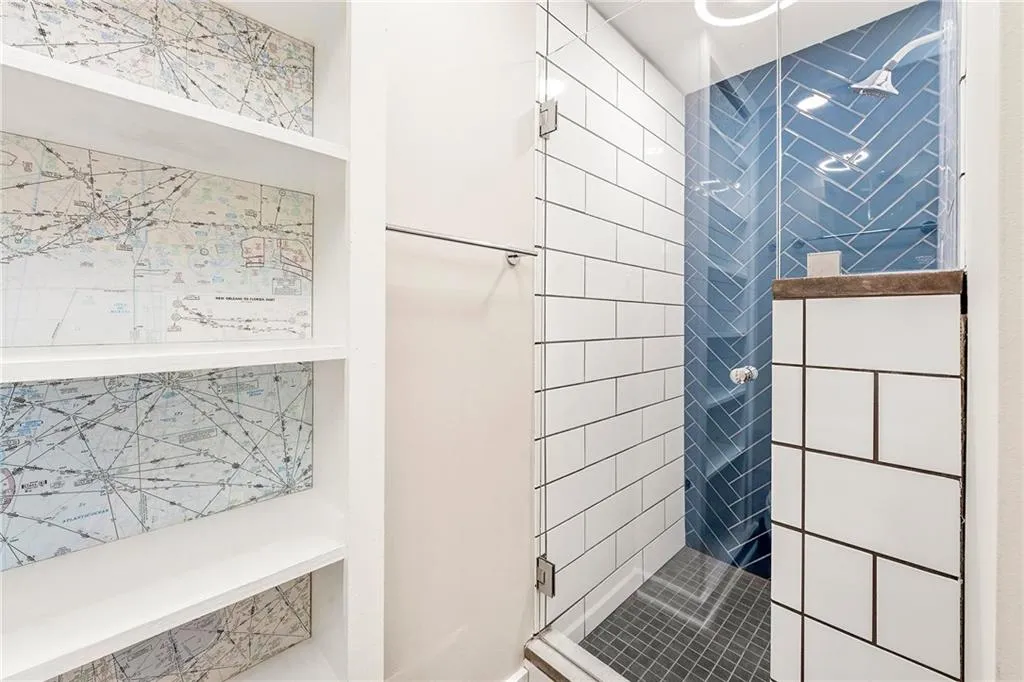 Full bath featuring a stall shower