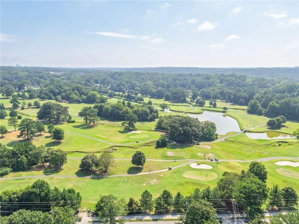 Drone / aerial view of a large body of water and a golf club