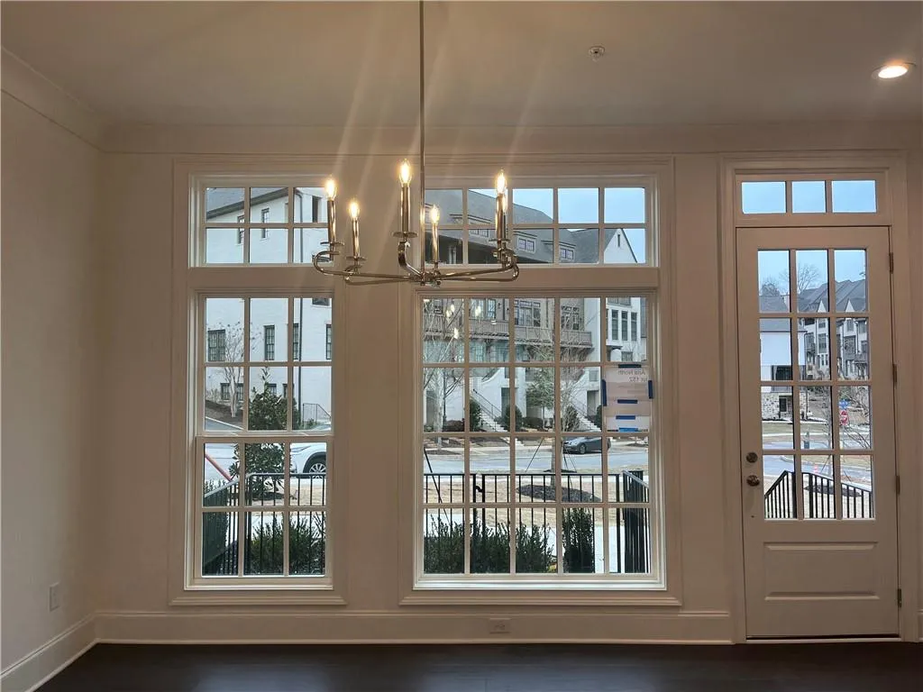 Beautiful Dining Room features transom windows to give great natural light.