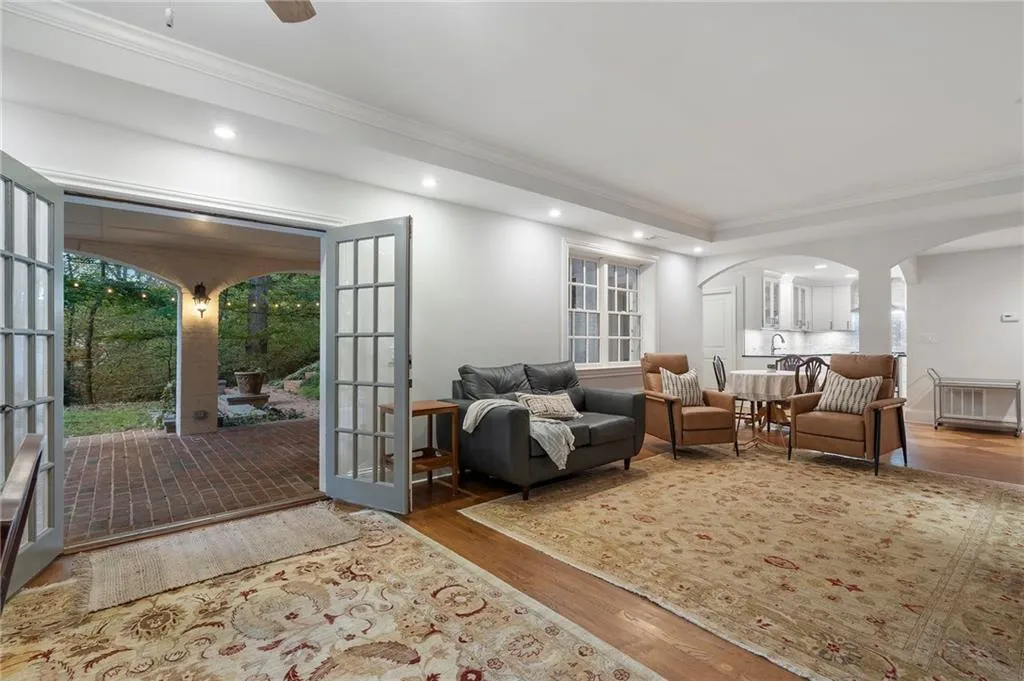 Terrace level living room with fireplace, full kitchen, 2 full baths, daylight bedroom and covered patio.