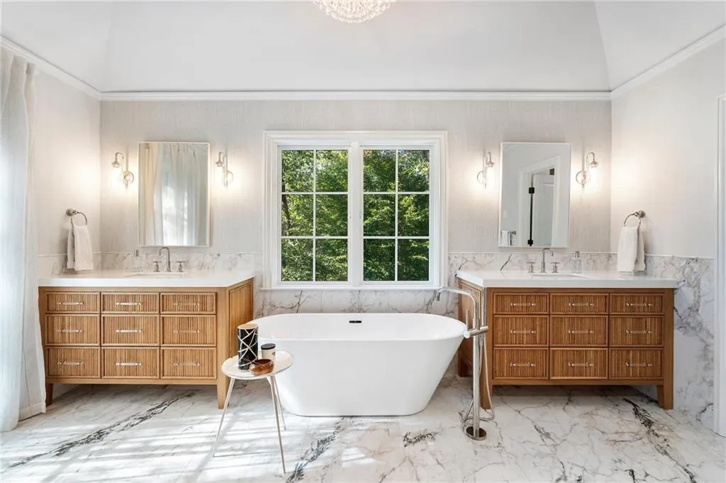 New primary bath with heated floors, double shower.