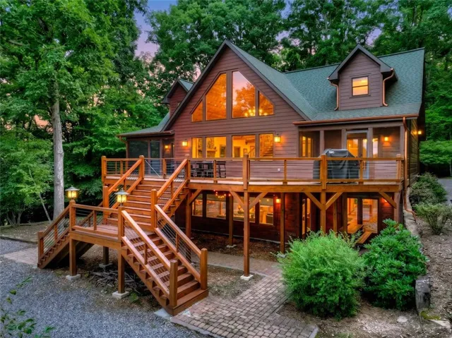 Multi-level deck with wood stairs and cable railings