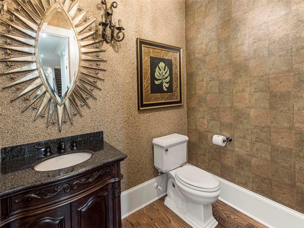 Second half bath on main off hallway