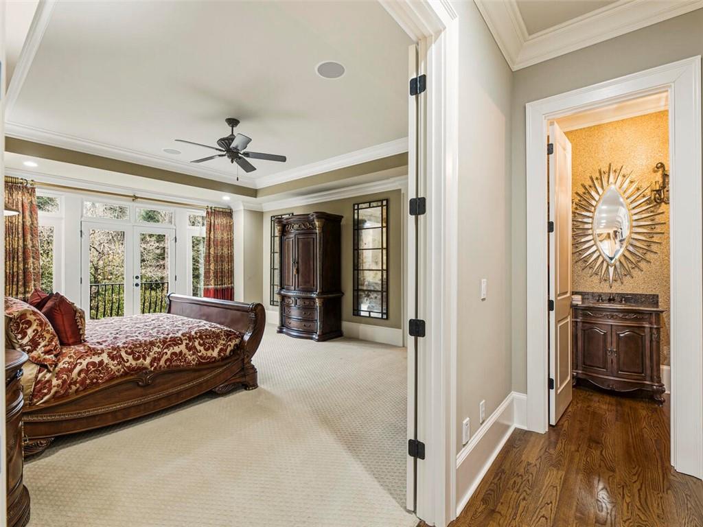 Double doors lead to fabulous owners suite on main