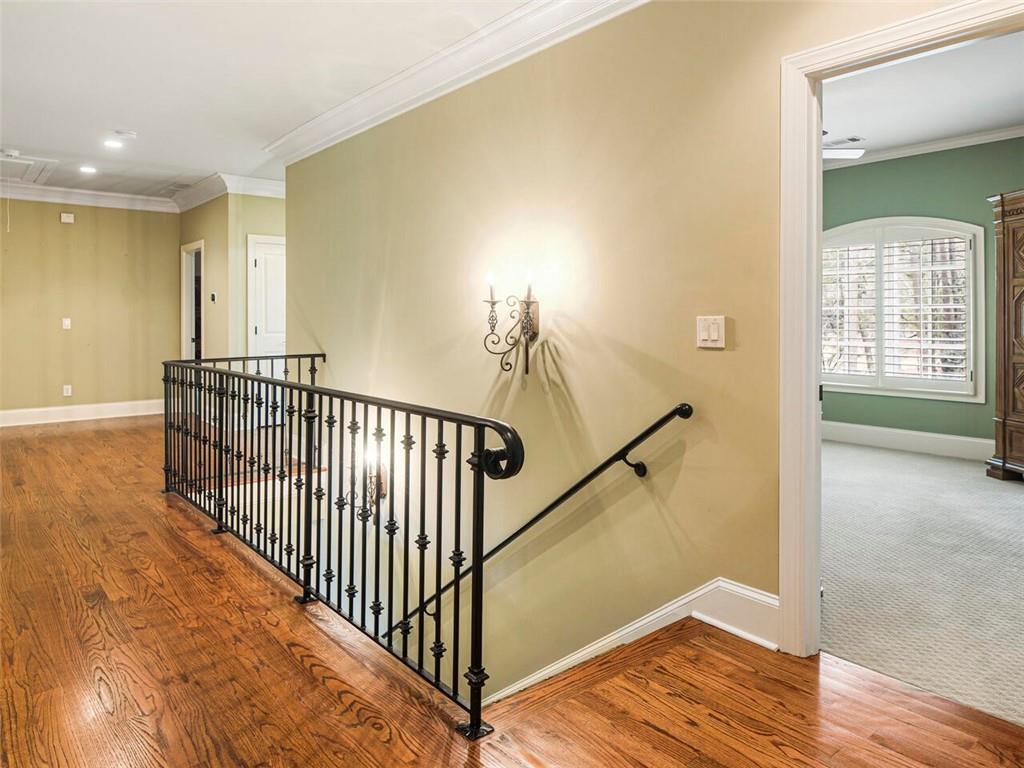 Upstairs landing with beautiful hardwood flooring