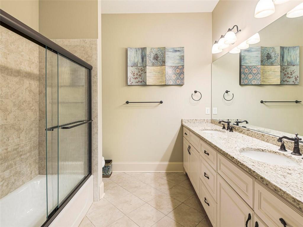 Full bath with double vanities