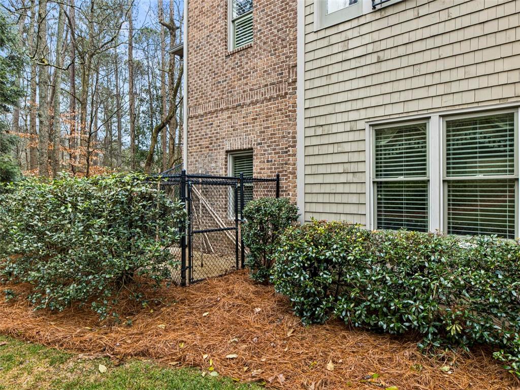 Fenced in dog run for added convenience