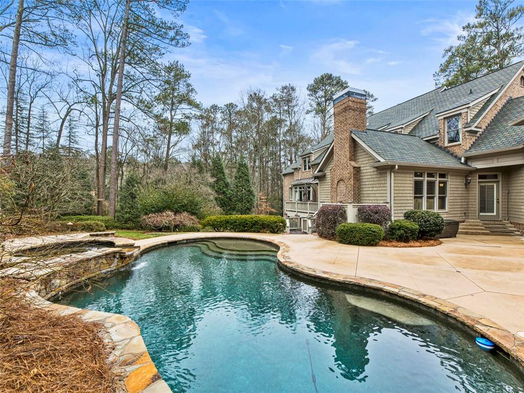 Pebble Tec pool and patio for year round gatherings