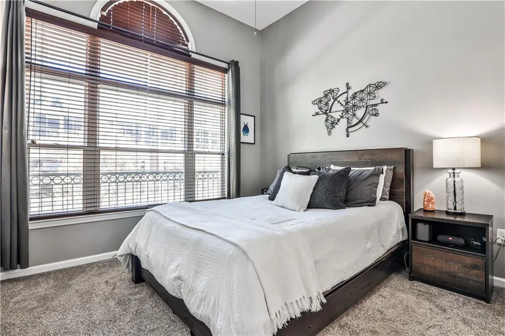 Carpeted bedroom with baseboards