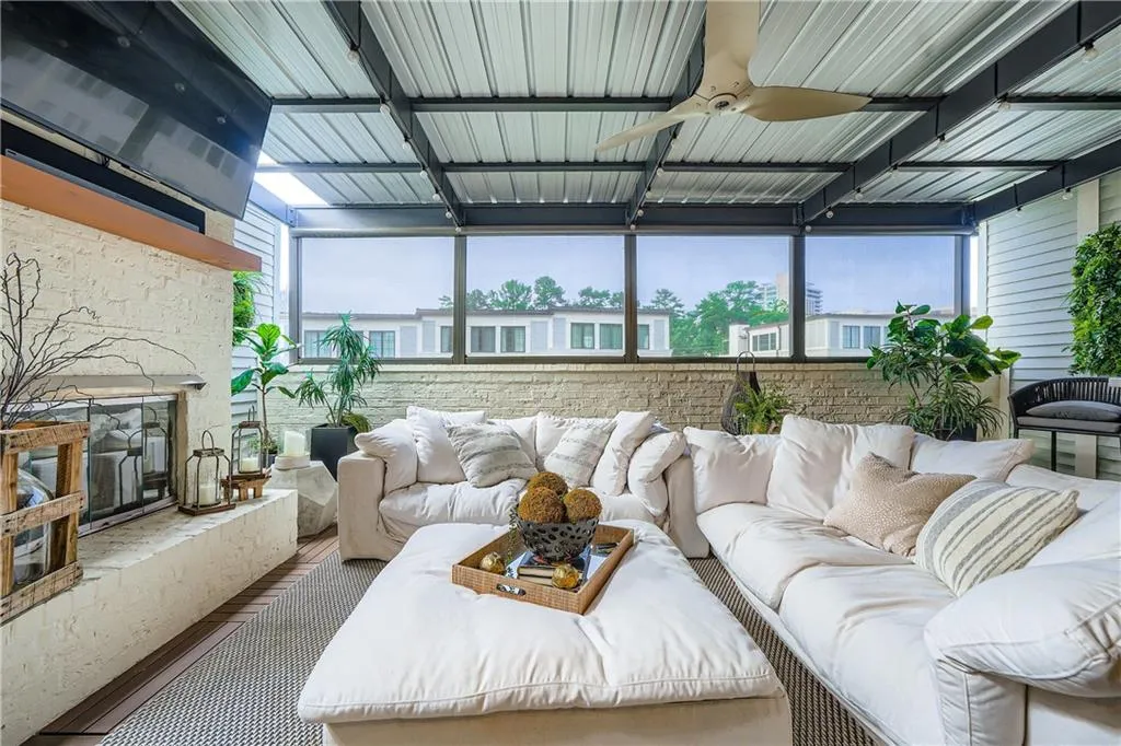 Sunroom / solarium featuring healthy amount of natural light