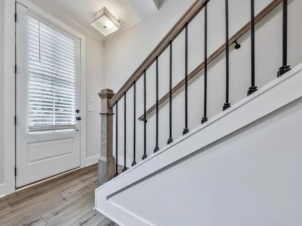 Foyer entrance with stairs and LVP floors
