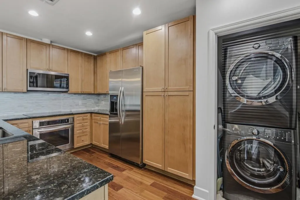 Updated stackable washer/dryer are perfect in this space!