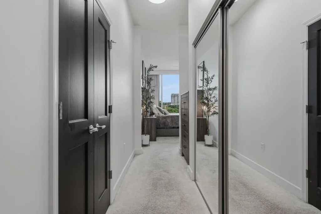Functional hallway provides lots of storage for Owners Suite