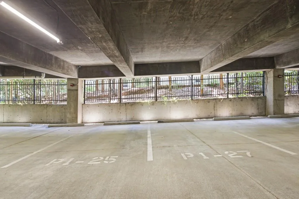 Two well'lit and wide side-by-side parking spaces