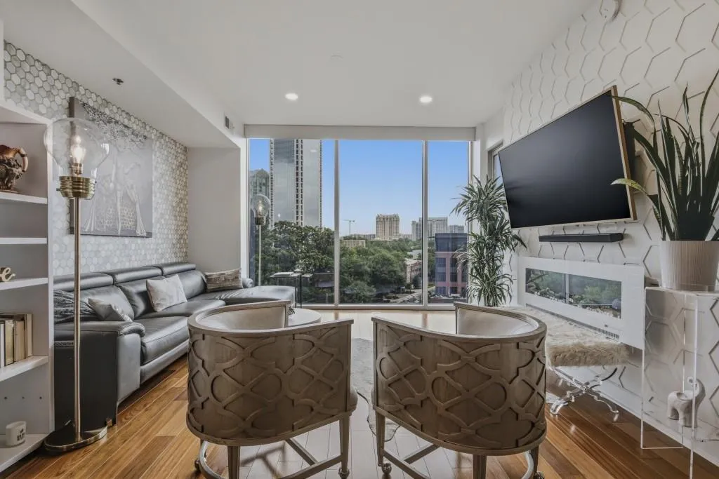 Accent walls and decorative linner fireplace are great designer touches