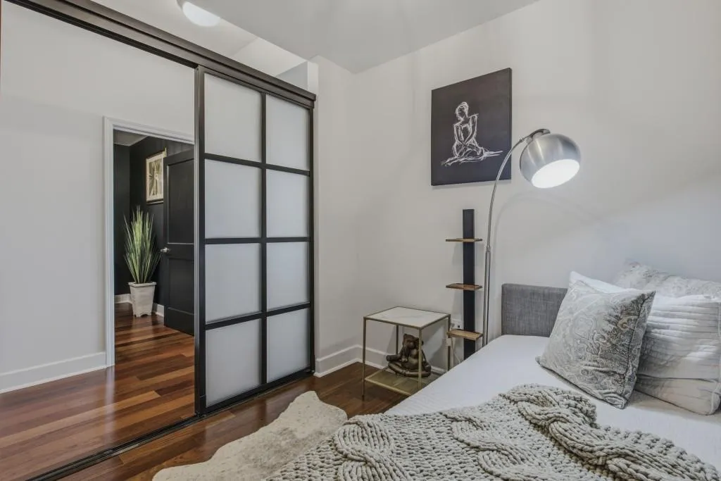 Sliding door separates this room from the main living area for privacy