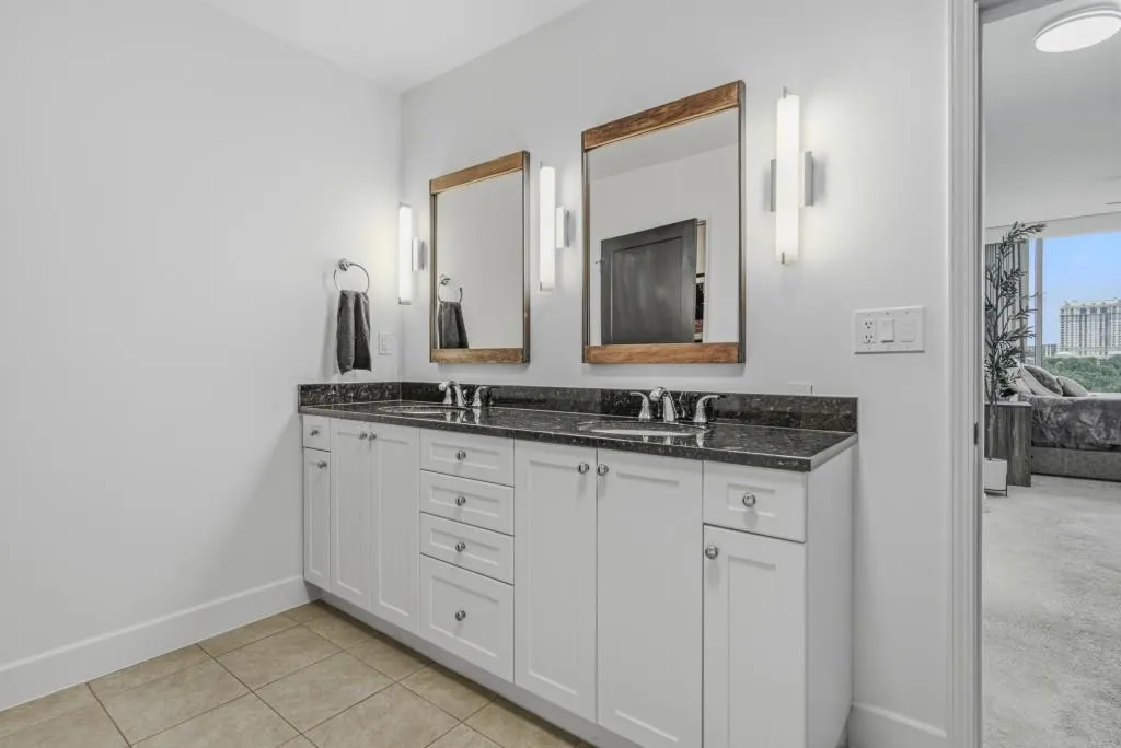 Double vanity, mirror, sinks and premier lighting