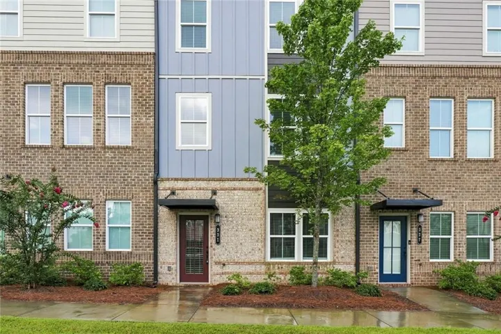 Brick and siding exterior with multiple windows