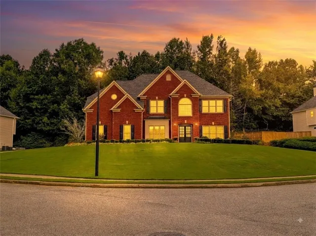 Welcome to this expansive, elevated corner lot lawn featuring manicured landscaping and pristine streetscape.