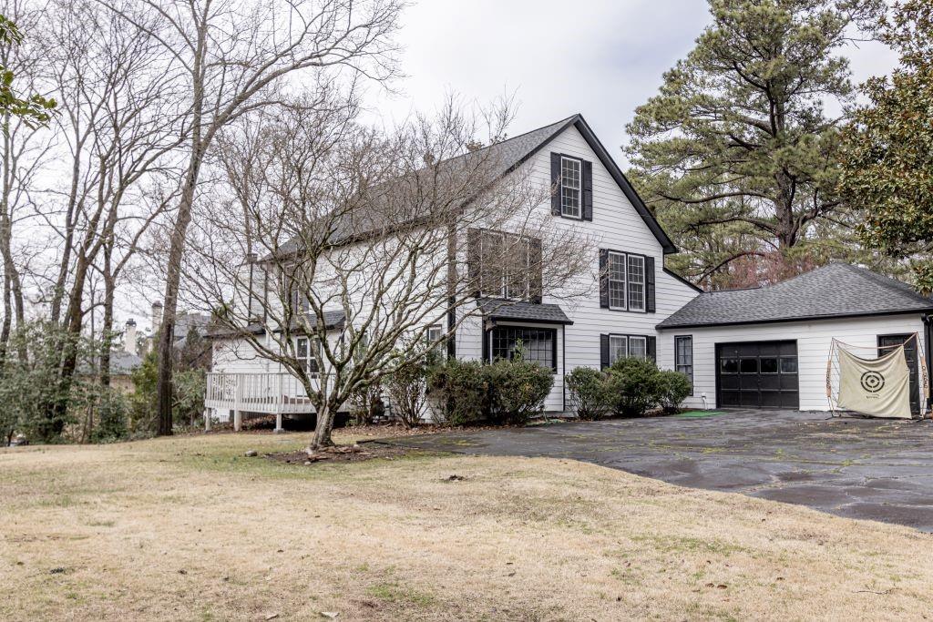 Front of property featuring a garage
