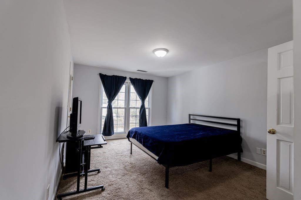 Bedroom featuring carpet floors