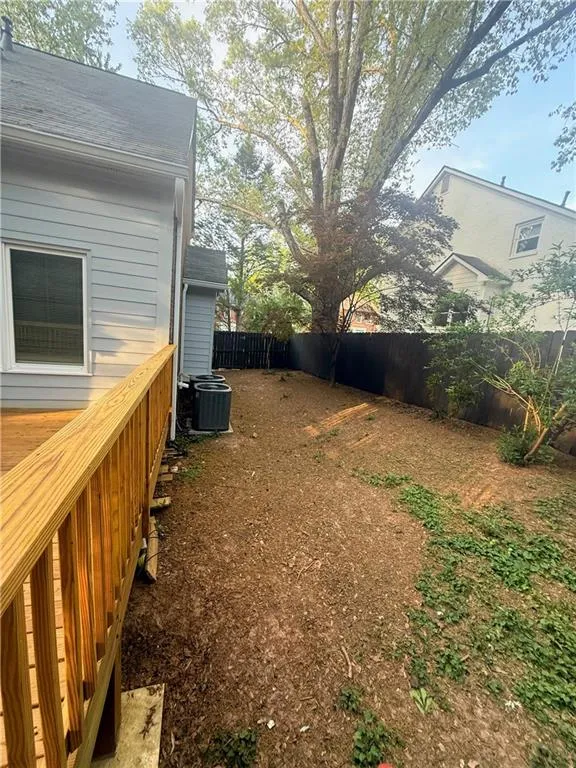 View of fenced backyard