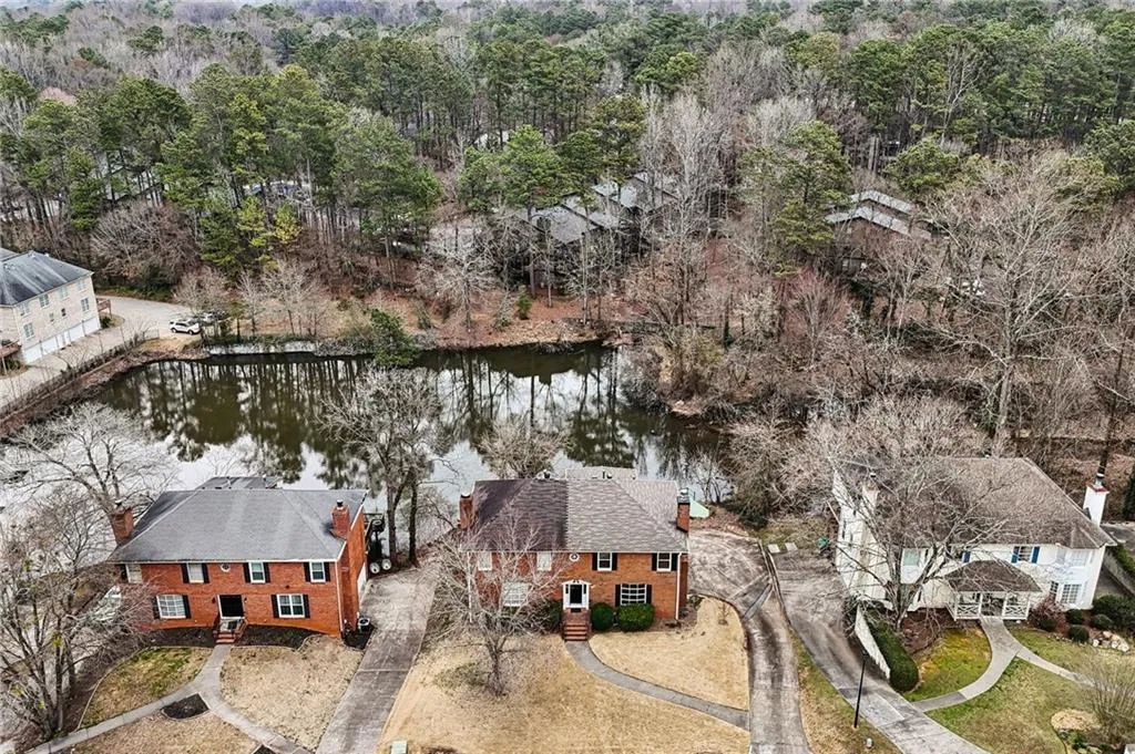 Aerial perspective 8923 Carroll Manor with view of pond.