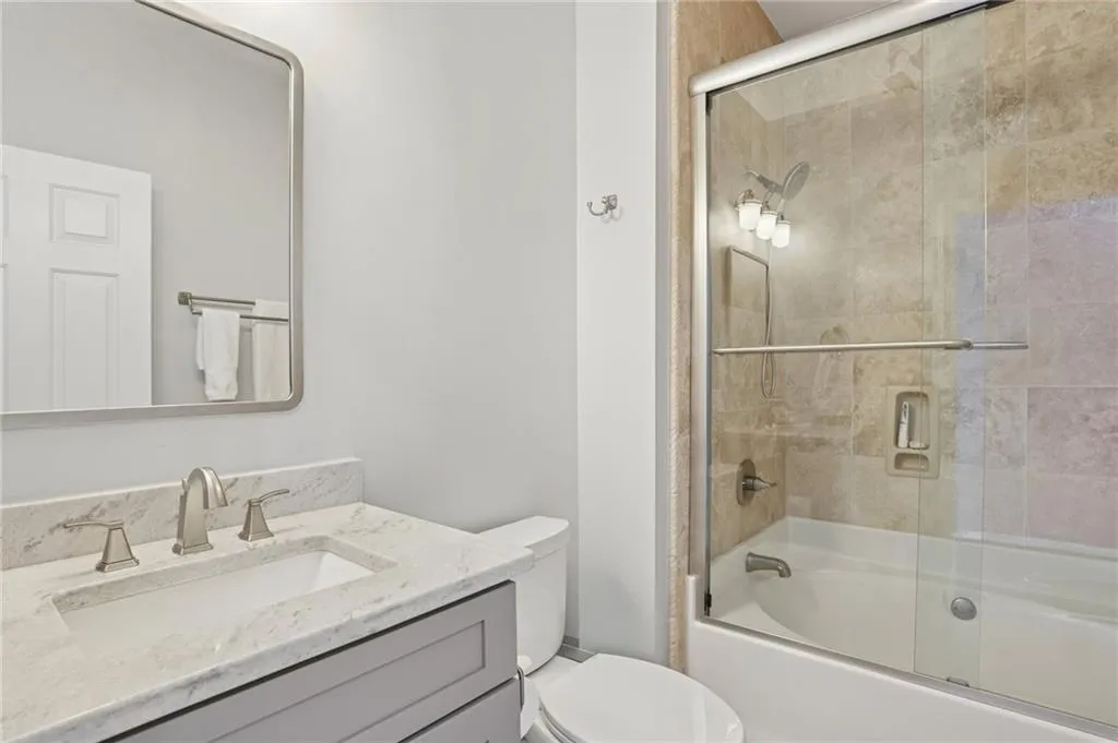 Full Bath Upper levelShower/Tub ComboGlass Enclosure