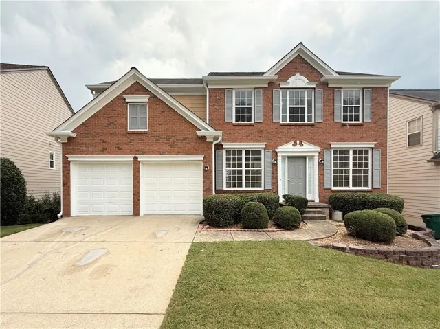 Brick exterior with a gabled roofline
