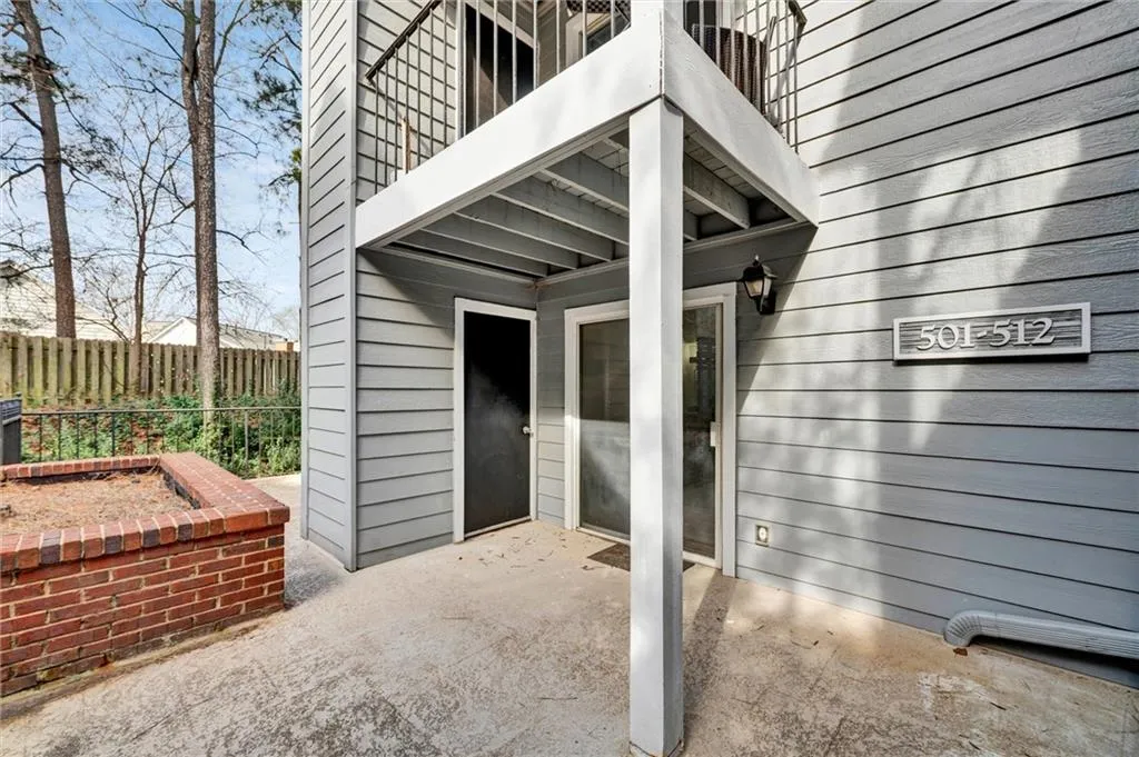 Doorway to property with a patio